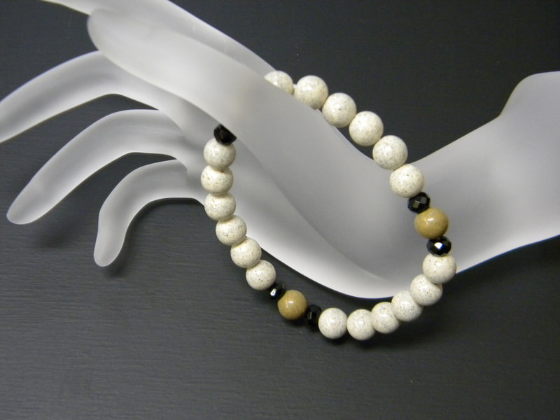 35番 8mm玉ブレスレット（玉川産北投石、台湾産北投石、オニキス） 北