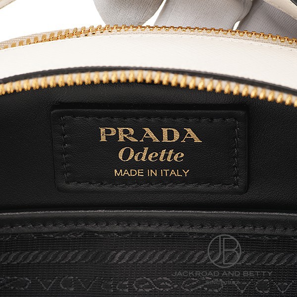 オデット サフィアーノ レザー バッグ ビアンコ ホワイト 白[1BH123