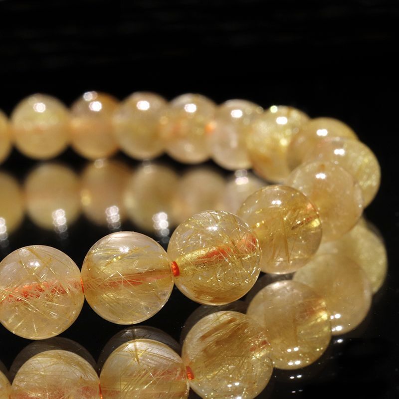 ブレス ルチルクォーツ＜ブラジル産＞ 丸 約7.5mm 金運 財運