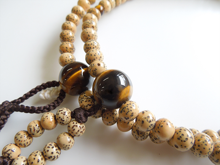 星月菩提樹二双半法華 虎目石仕立 焦茶かがり梵天 お数珠の安田念珠店