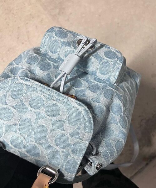 COACH（コーチ）の「リア バックパック 21・シグネチャー デニム