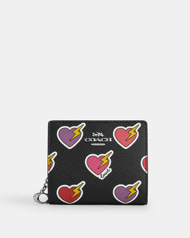公式】コーチアウトレット | スナップ ウォレット・ハート ボルト プリント