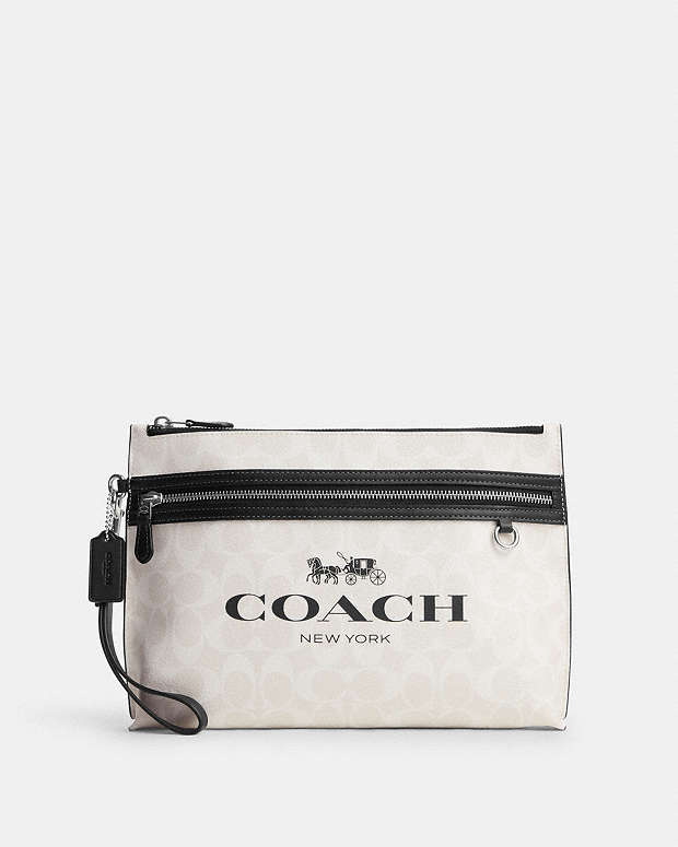 公式】コーチアウトレット | キャリー オール ポーチ・シグネチャー