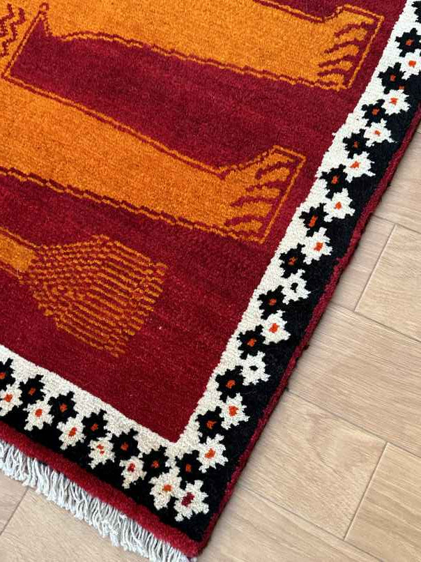 トライバルライオンラグ 150×100cm 手織り 赤【返品保証】 (LO-0105