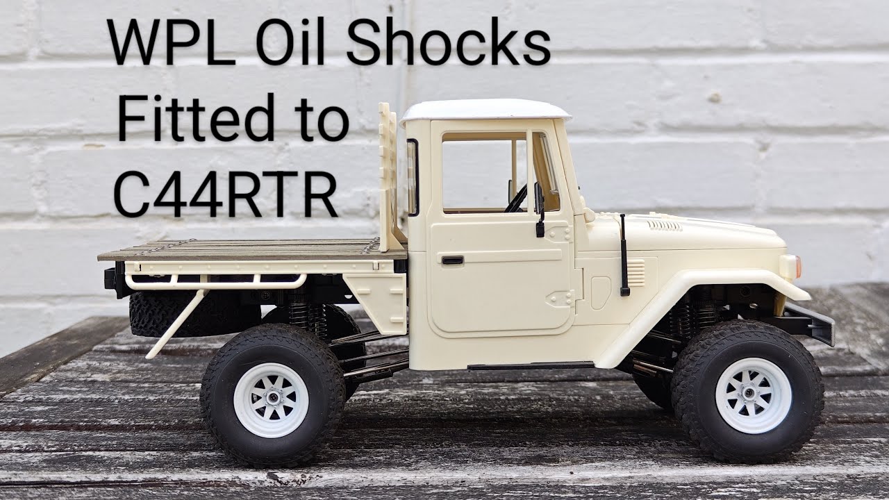 Fitting WPL Oil Shocks to a modded C44RTR - YouTube
