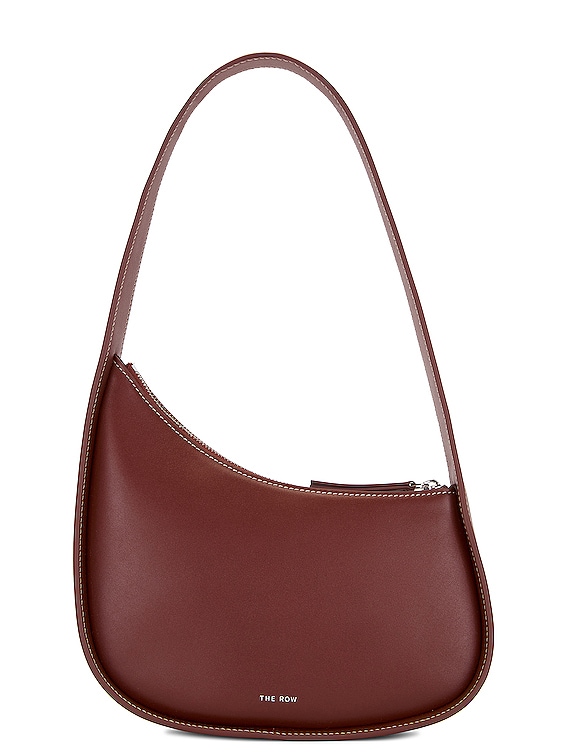The Row Half Moon Bag in Cherry Wood PLD | FWRD