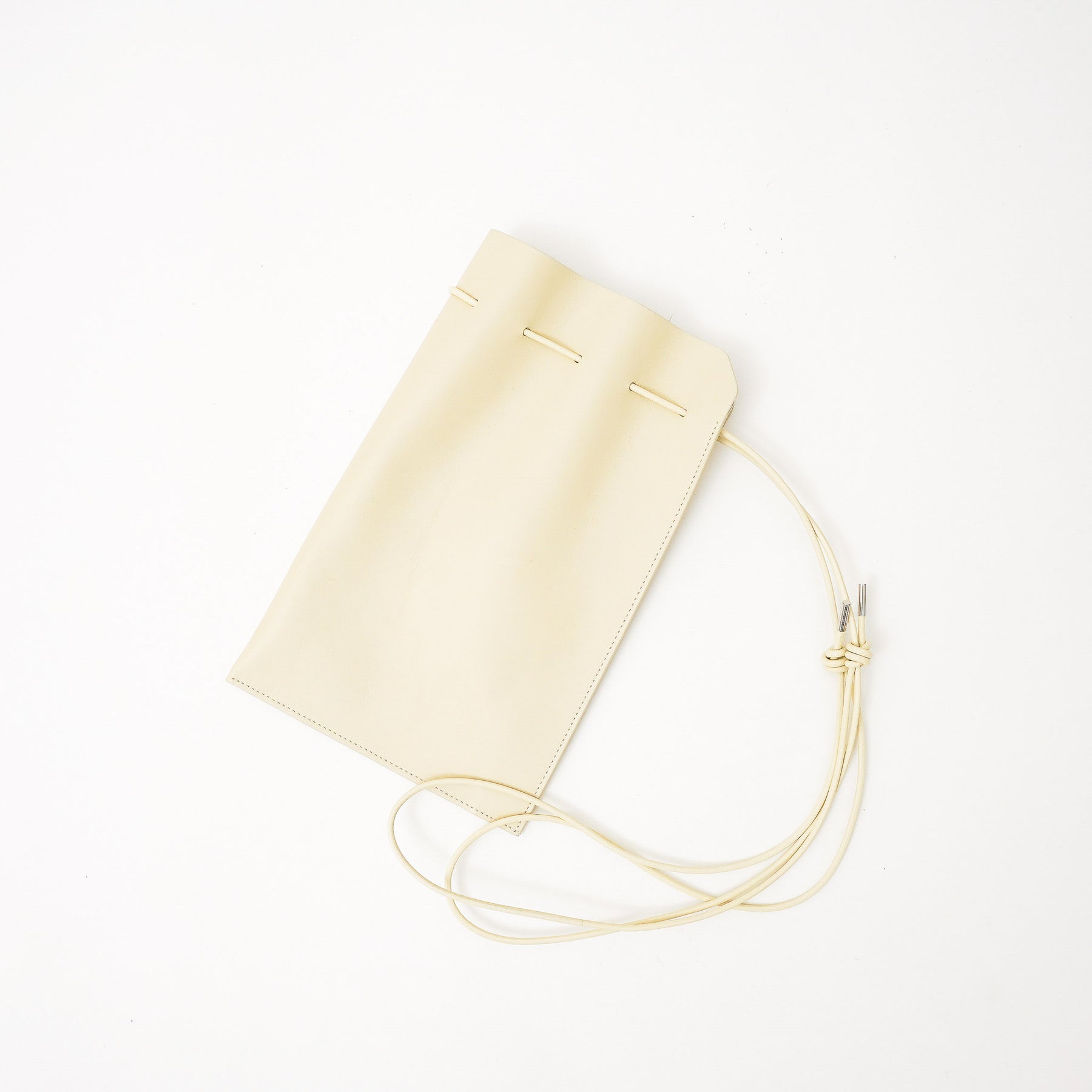 HERRIE KINCHAKU POUCH - PM / RAPTO FLEX｜ミニマル 巾着ポーチ 本革