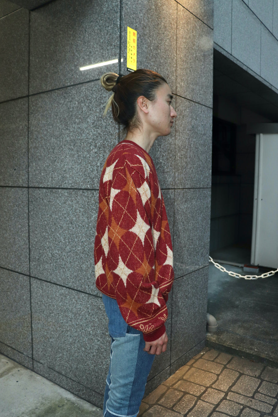 Taiga Igari(タイガ イガリ)のDiamond V-neck Sweater Garnetの通販