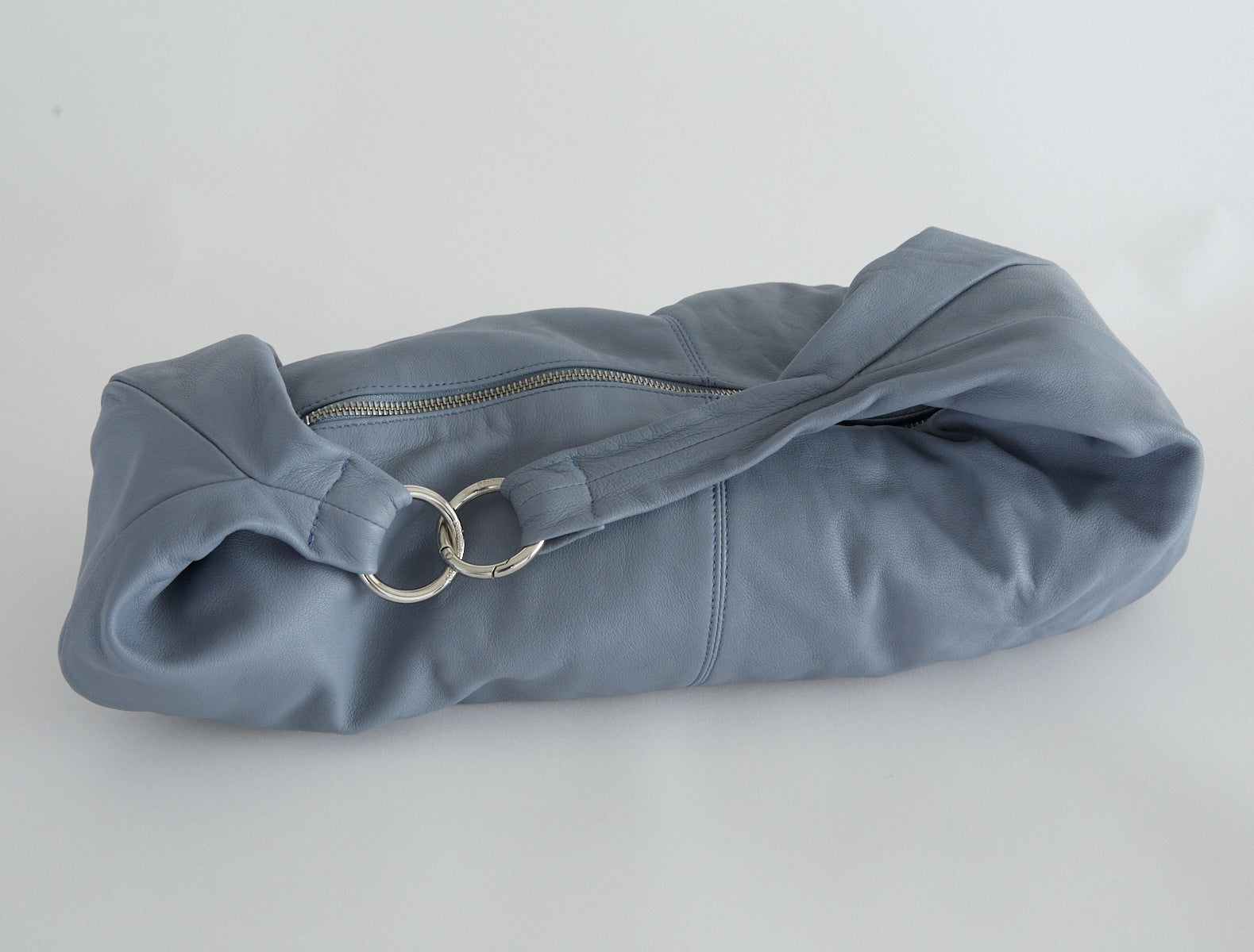 DRY-Light greyishblue elongated, wrap-around hobo-style shoulder