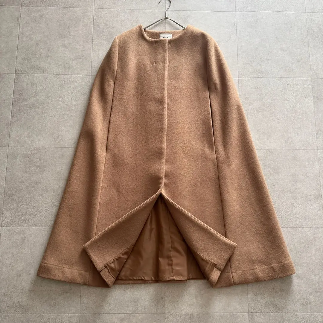 2026年最新】ellie ポンチョコートの人気アイテム - メルカリ