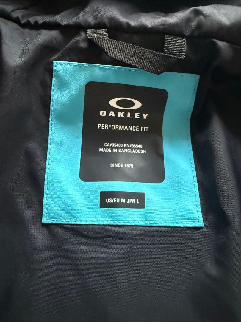 Oakley 防水ジャケット 水色