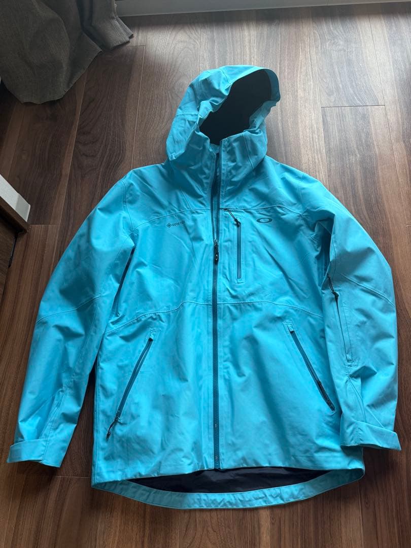 Oakley 防水ジャケット 水色