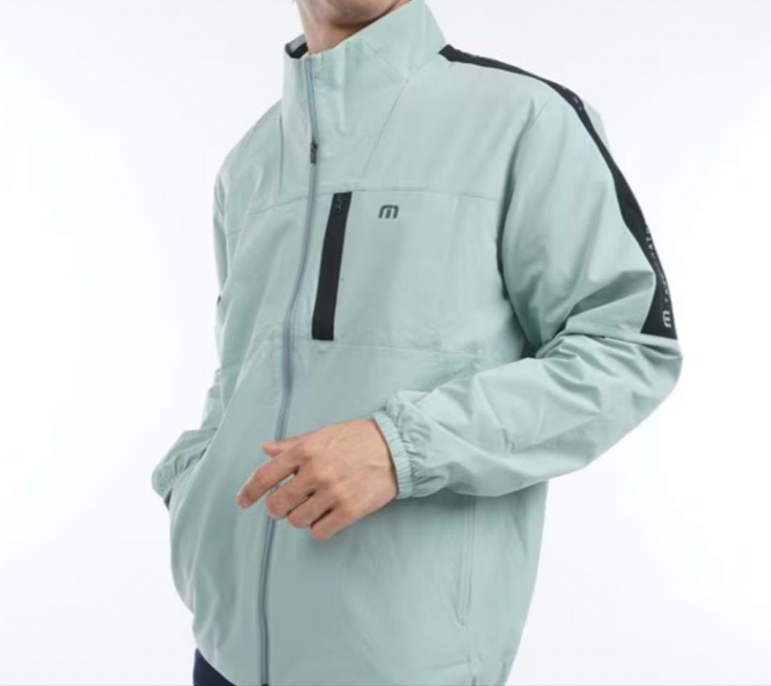 新品未使用トラビスマシュー　ラインウインドブレーカー　メンズMサイズ　ジェダイド