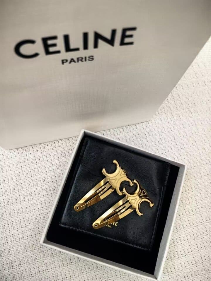 トリオンフ スナップヘアクリップ ヘアアクセサリー ゴールド - メルカリ