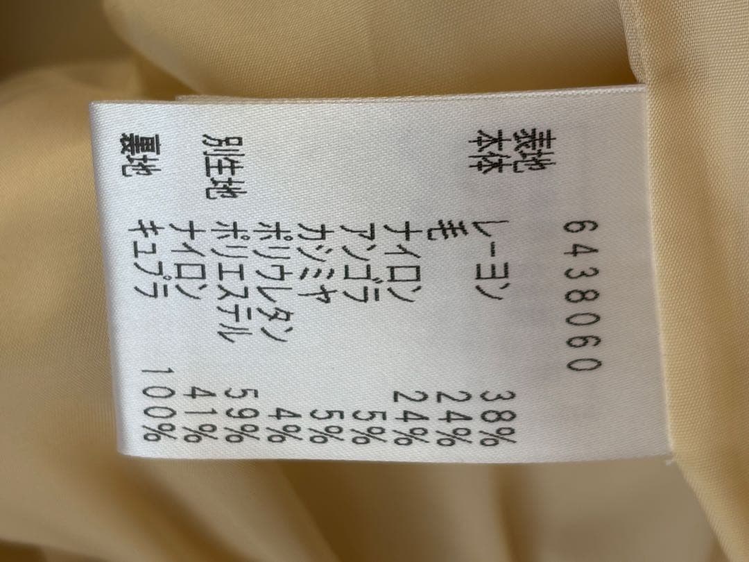 クリーム色 ロングコート ジップアップ　ファートリミング