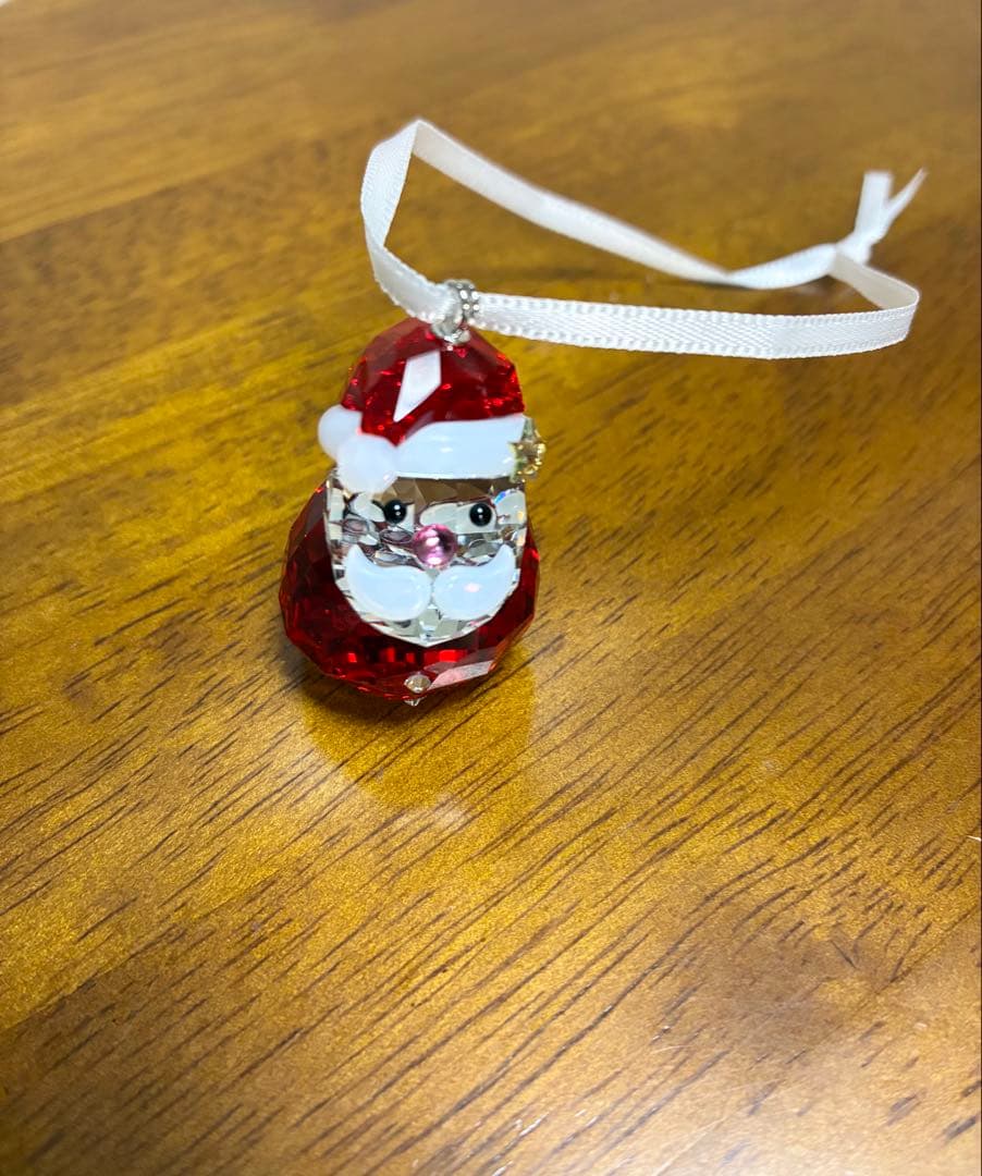 新品】SWAROVSKI スワロフスキー ピンク鼻＆星付ロッキングサンタ