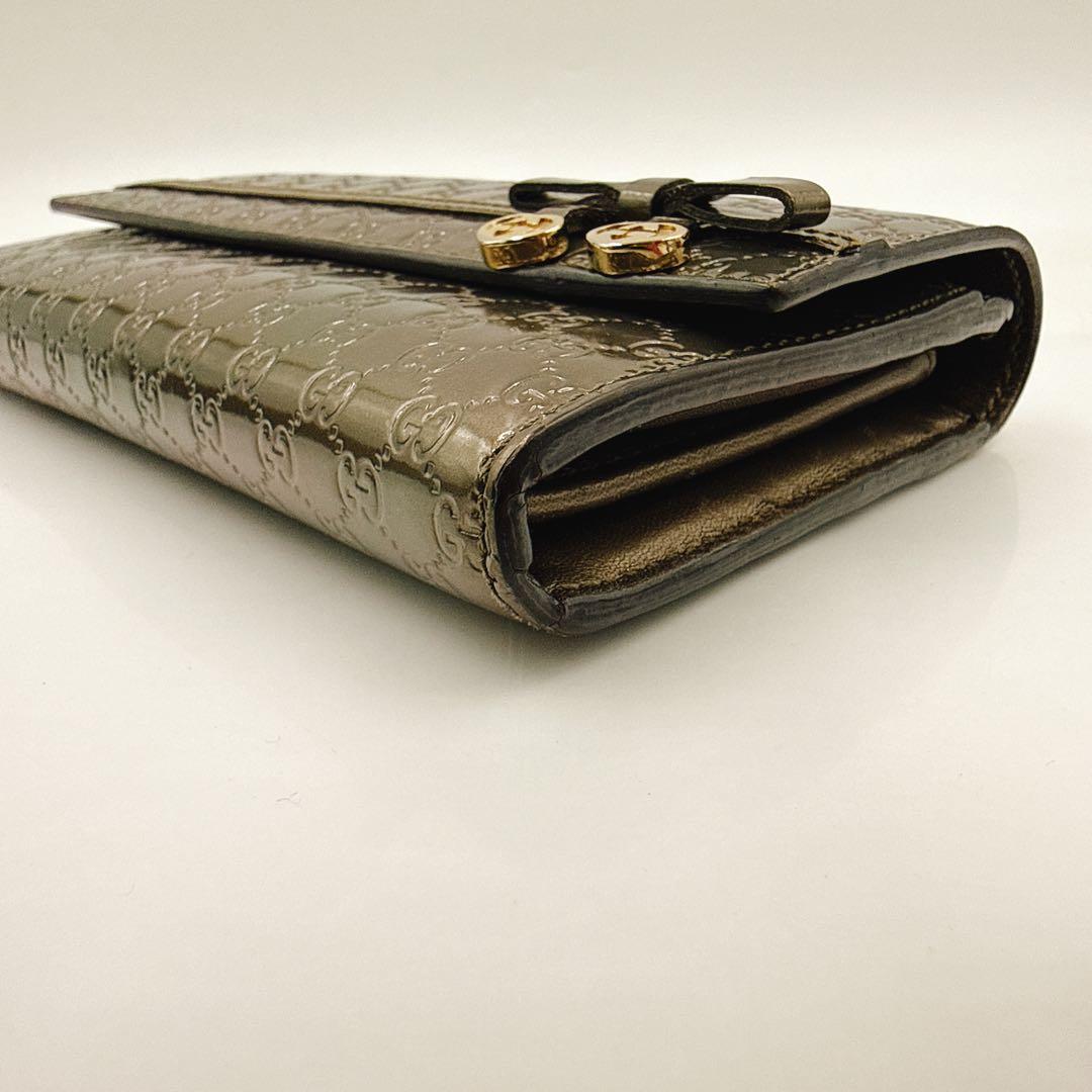 GUCCI グッチ 長財布 マイクロGG パテントレザー リボン 253405 - メルカリ