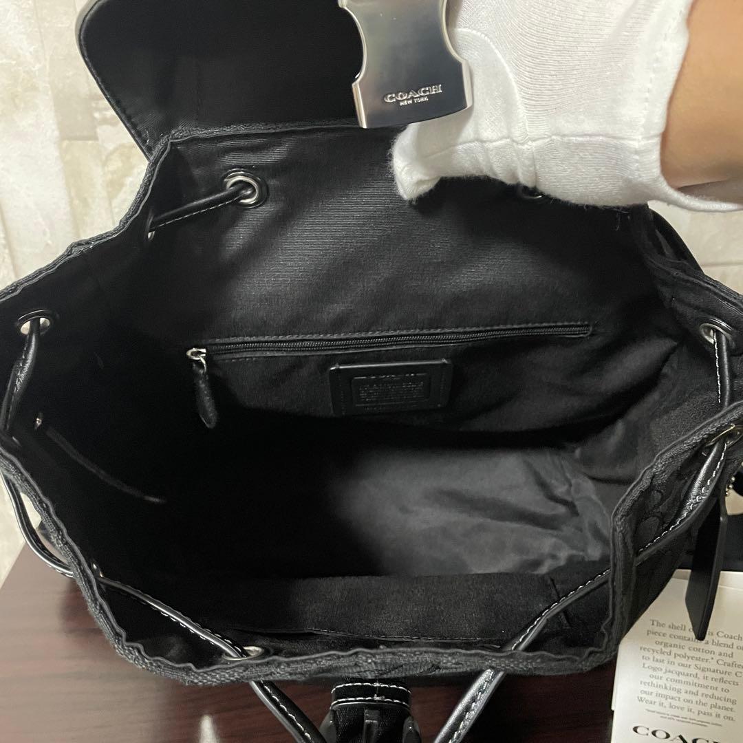 早い者勝ち！訳あり新品 COACH バックパック シグネチャー柄 ブラック