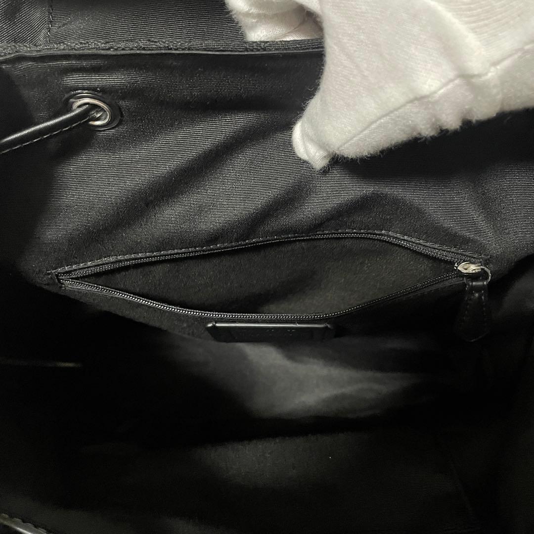 早い者勝ち！訳あり新品 COACH バックパック シグネチャー柄 ブラック