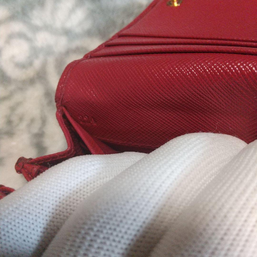 PRADA サフィアーノメタルラインレッド系 長財布