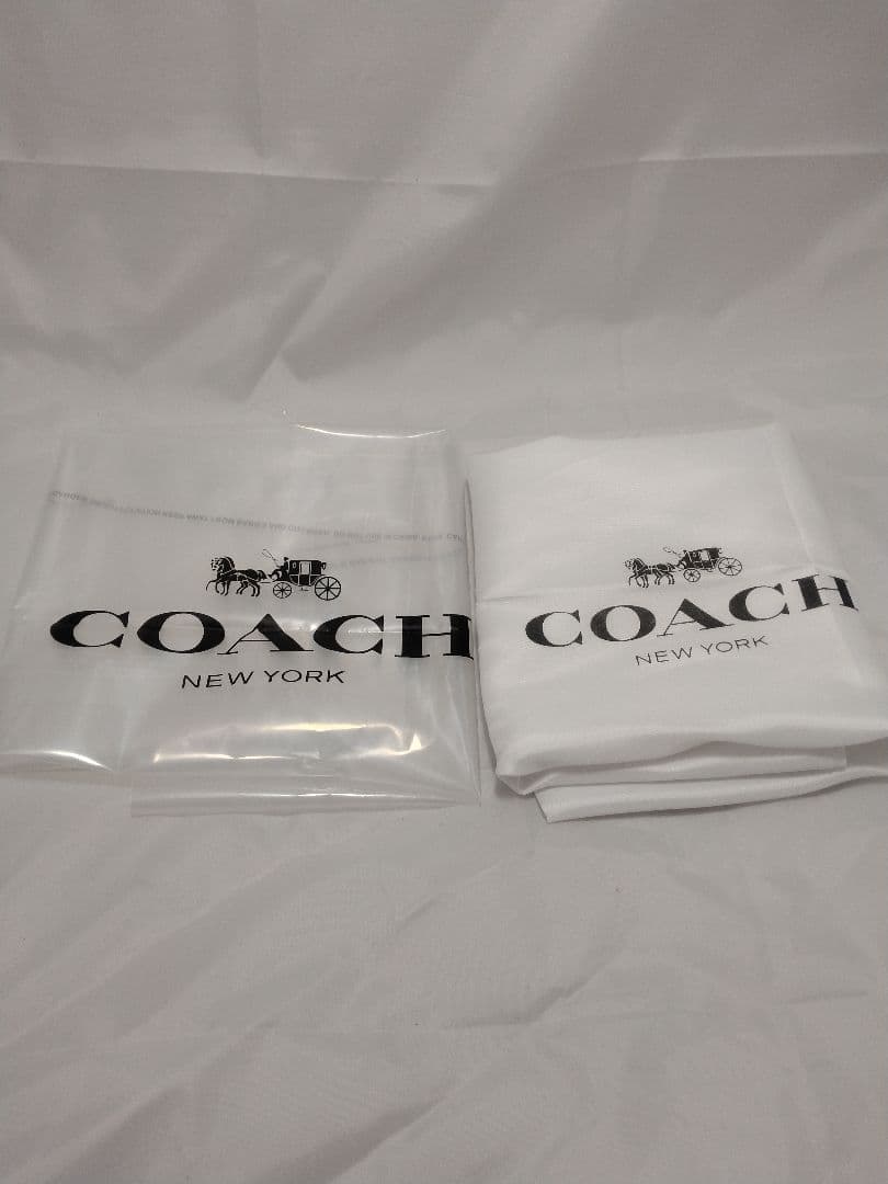 【新品未使用】COACH コーチシグネチャー バックパックリュック茶 C5671
