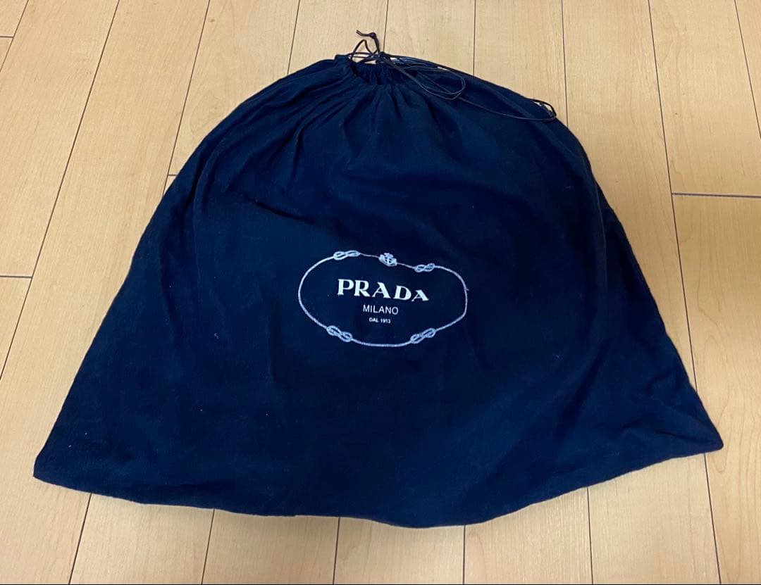 値下げ【未使用、やや難あり】PRADA 青リュック・バックパック　保存袋ステート