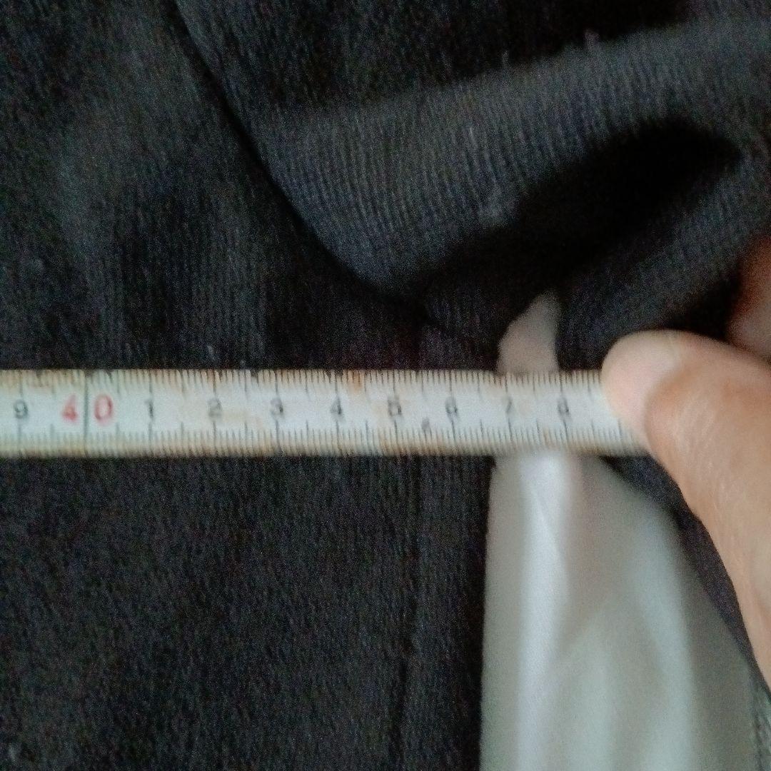 ヴェルサーチ黒のフルジップアップセーター Vエンブレム付き