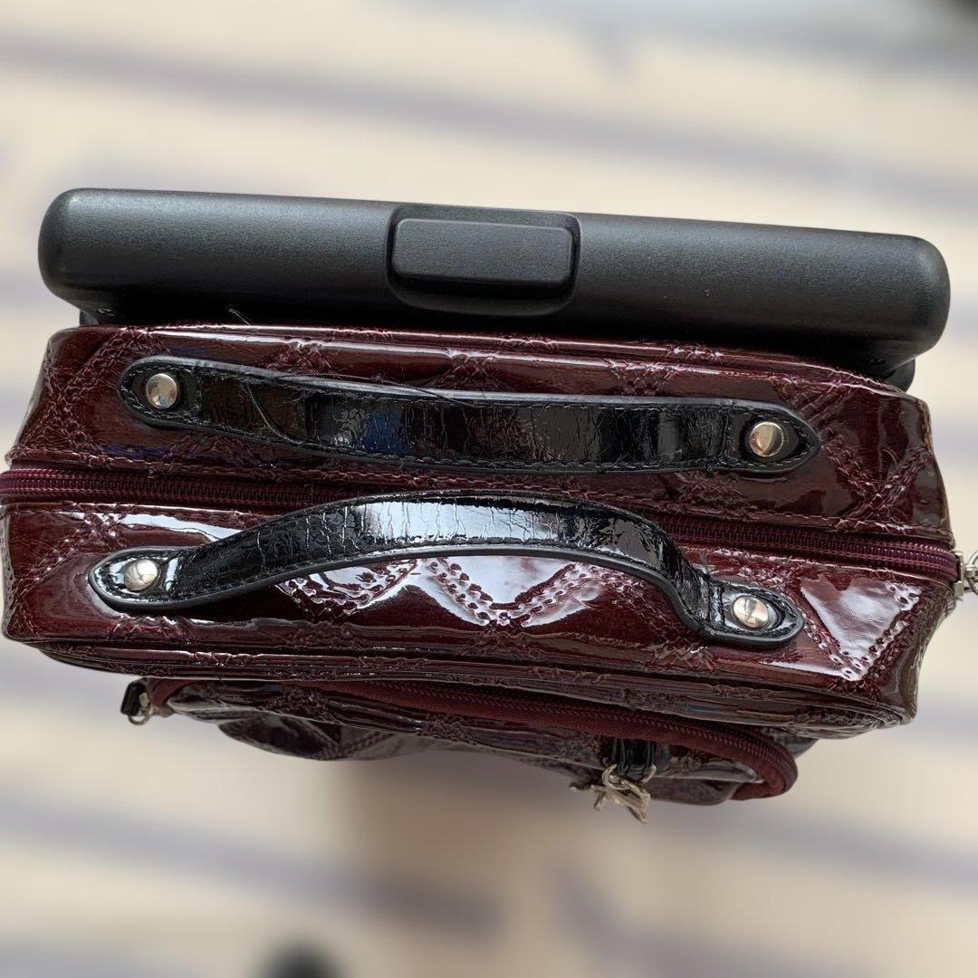 スワニーSwanyキャリーショッピングバッグ エナメルエマイロボルドー