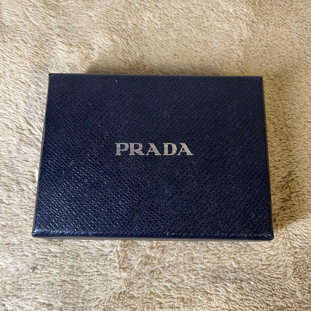 プラダ PRADA がま口 キーホルダー チャーム ベージュ 1AR71