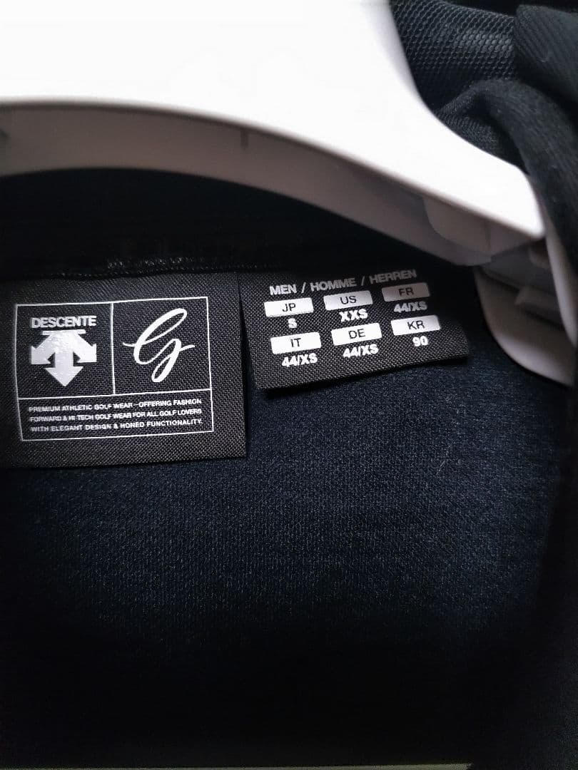 デサントゴルフ ウール ミックス ジップアップパーカー 黒 - メルカリ