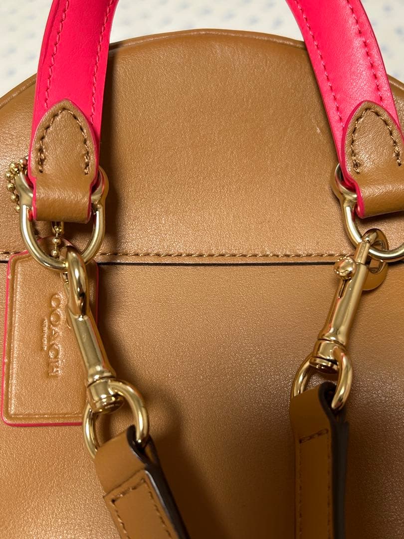 値下げ‼️コーチ リュックサック シグネチャー PVC×レザー ブラウン×ピンク