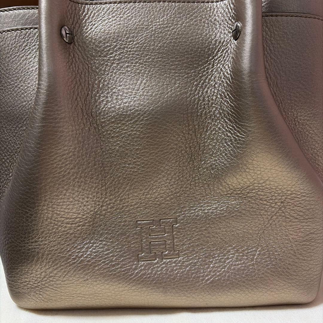 ヒロフ　メタリックゴールド レザー ハンドバッグ