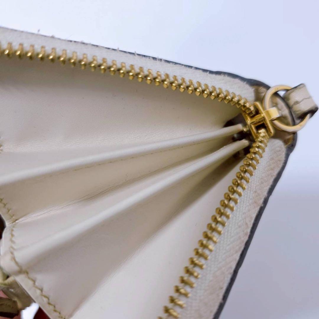 GUCCI グッチ　長財布　ラウンドファスナー　GG シマ　レザー　ホワイト