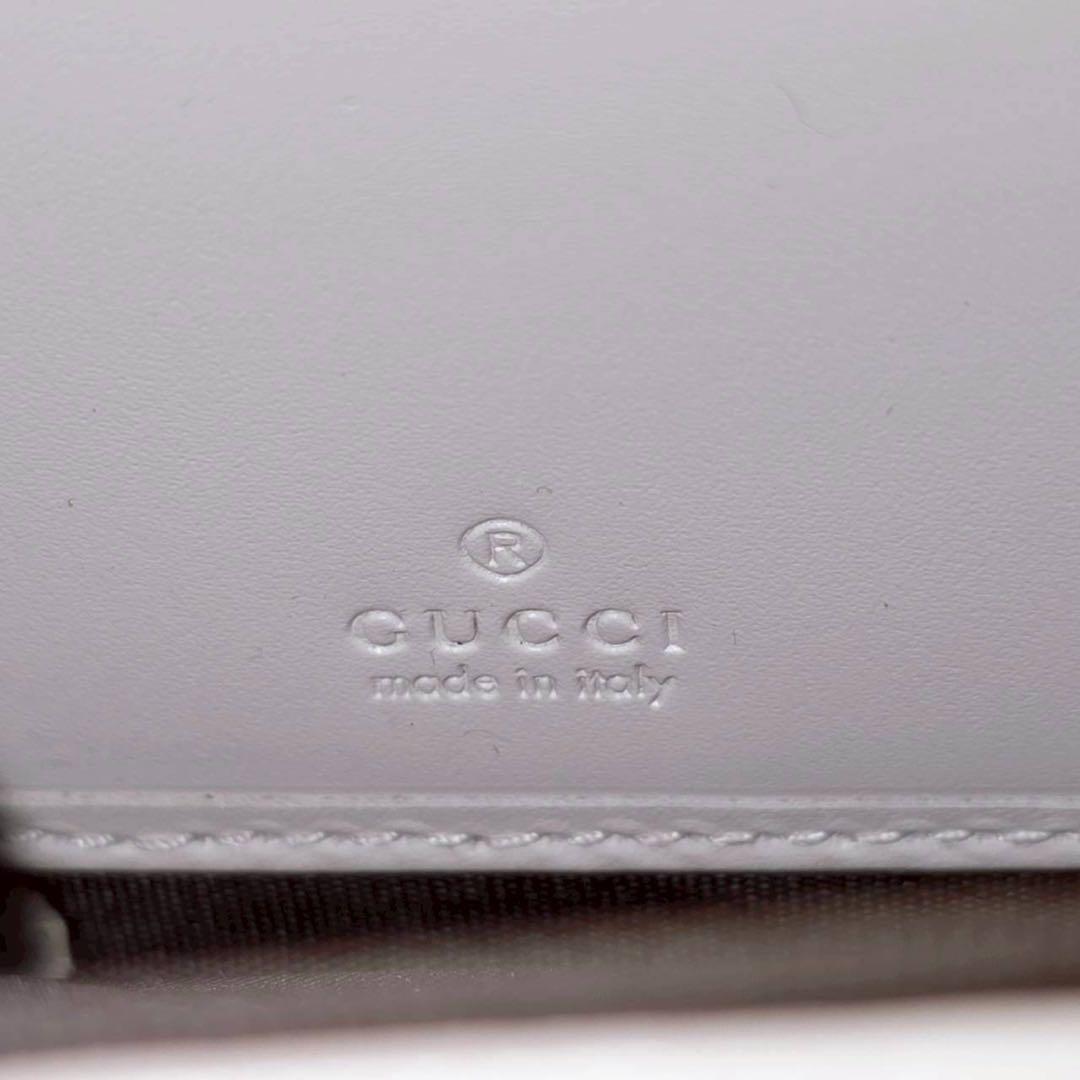 GUCCI グッチ　長財布　ラウンドファスナー　GG シマ　レザー　ホワイト