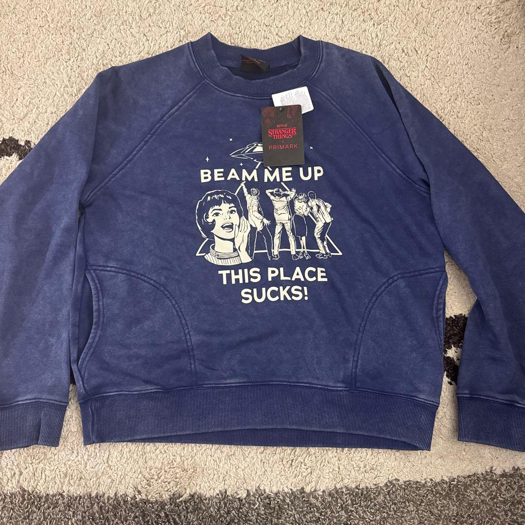 新品公式】ストレンジャーシングス スウェット ロビン BEAM ME UP