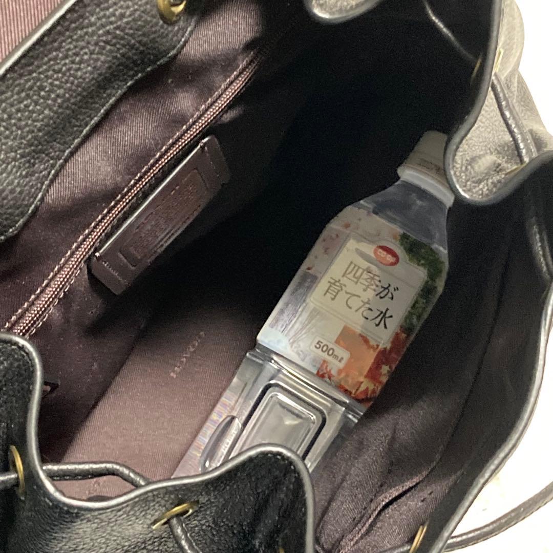 極美品　コーチ　リュック　バックパック イーヴィ　巾着　Cロゴ　黒　チャーム付き