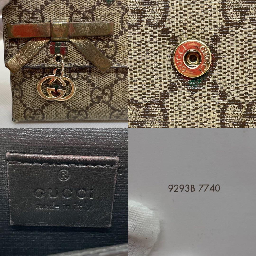 【美品/付属品完備】グッチ 二つ折り財布 小銭 GGシマ リボン ロゴチャーム
