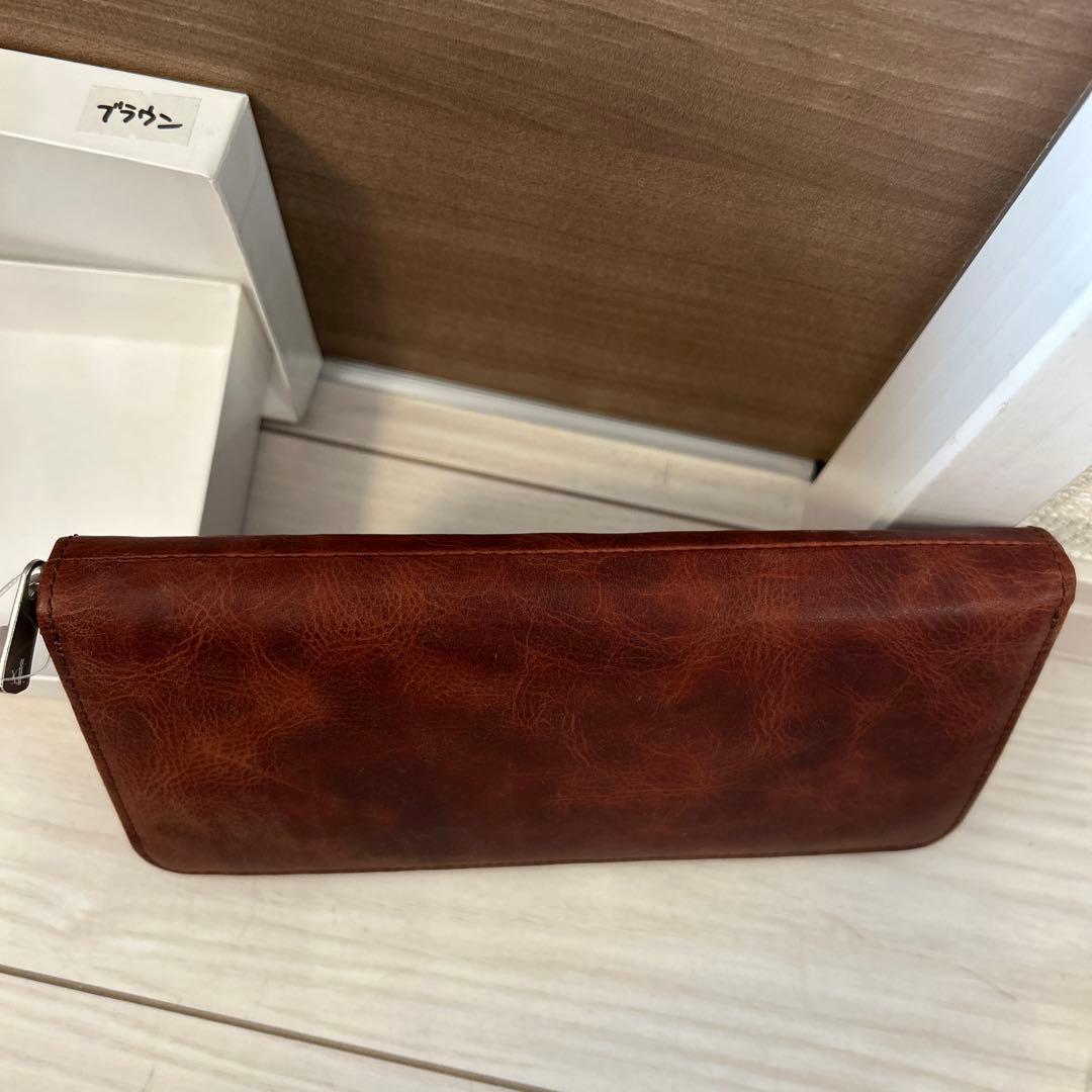 【未使用】スヌーピー 本革　長財布　型押し　ラウンドファスナー　箱入り