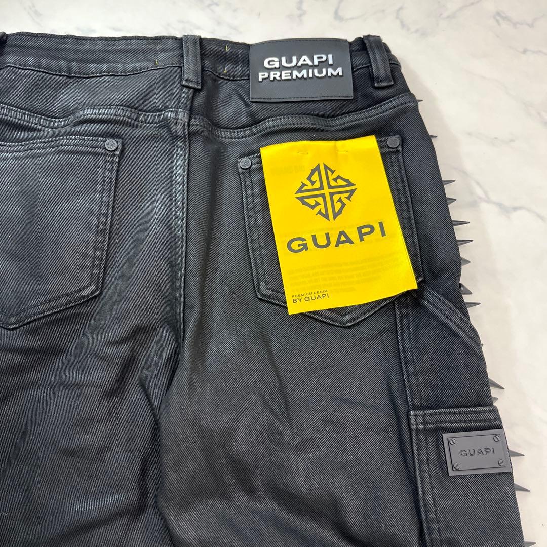 ヤングパトラ着用グアピGUAPI オールブラックスパイクフレアワックスデニム32