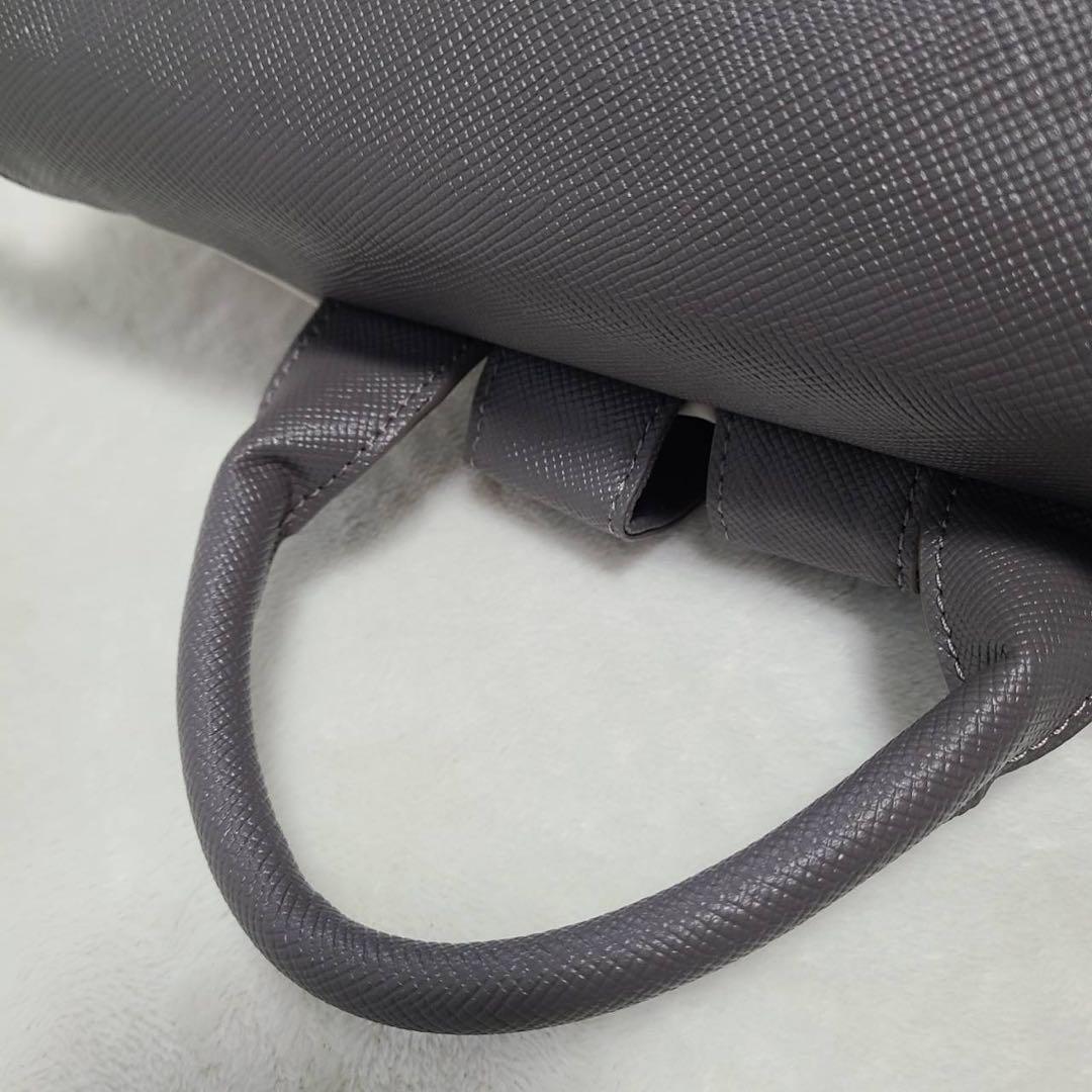 earPAPILLONNER樹脂 ×メタルパーツリュック グレー&ベージュ