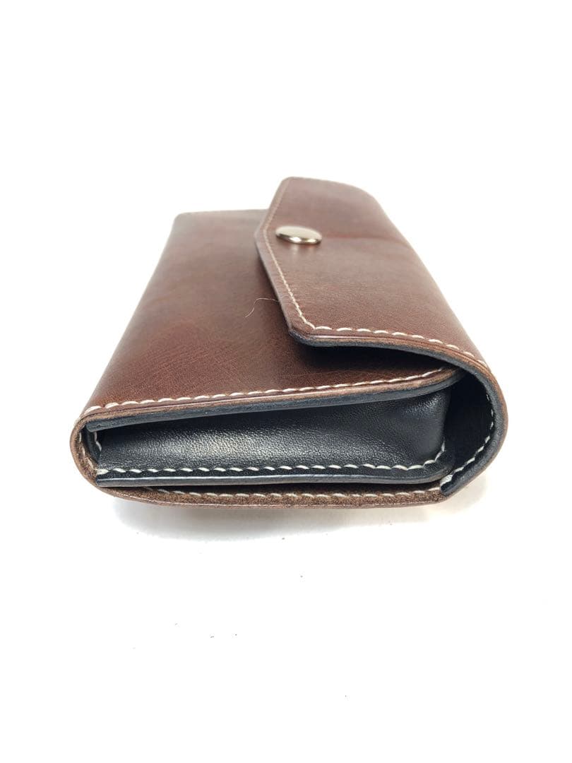 ツートンカラーがカジュアルなオイルヌメ革三つ折りシャグポーチ