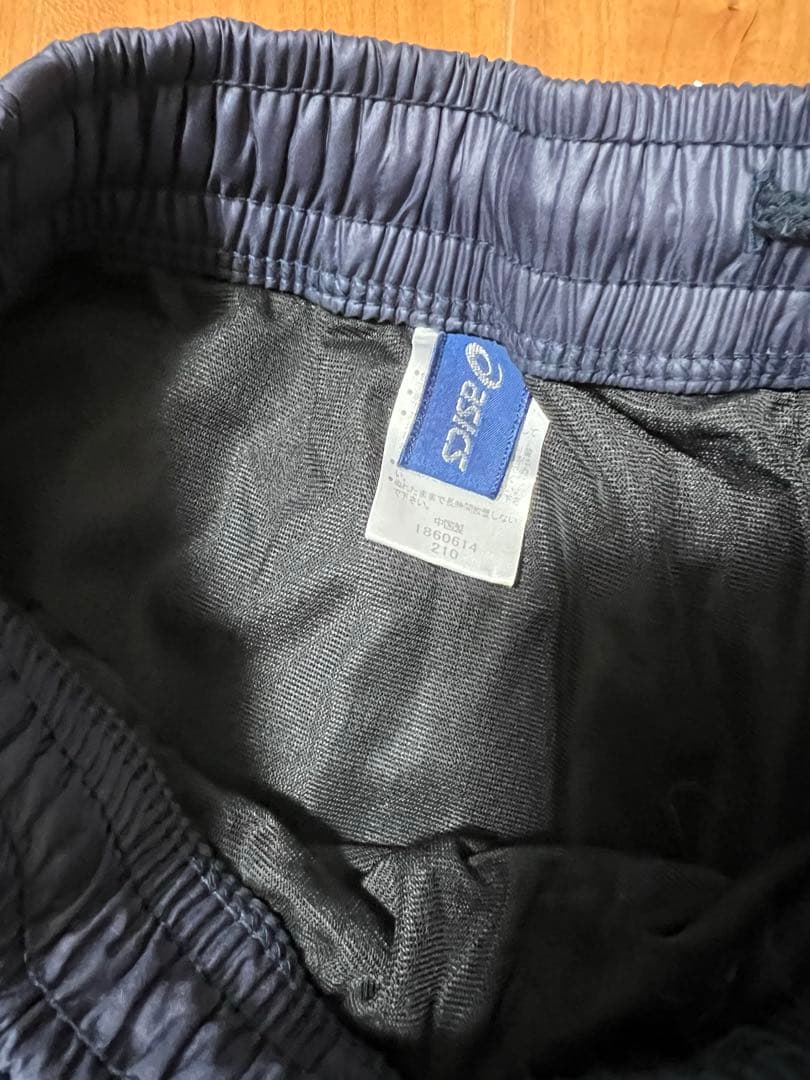 ASICS ウィンドブレーカー 青/黒