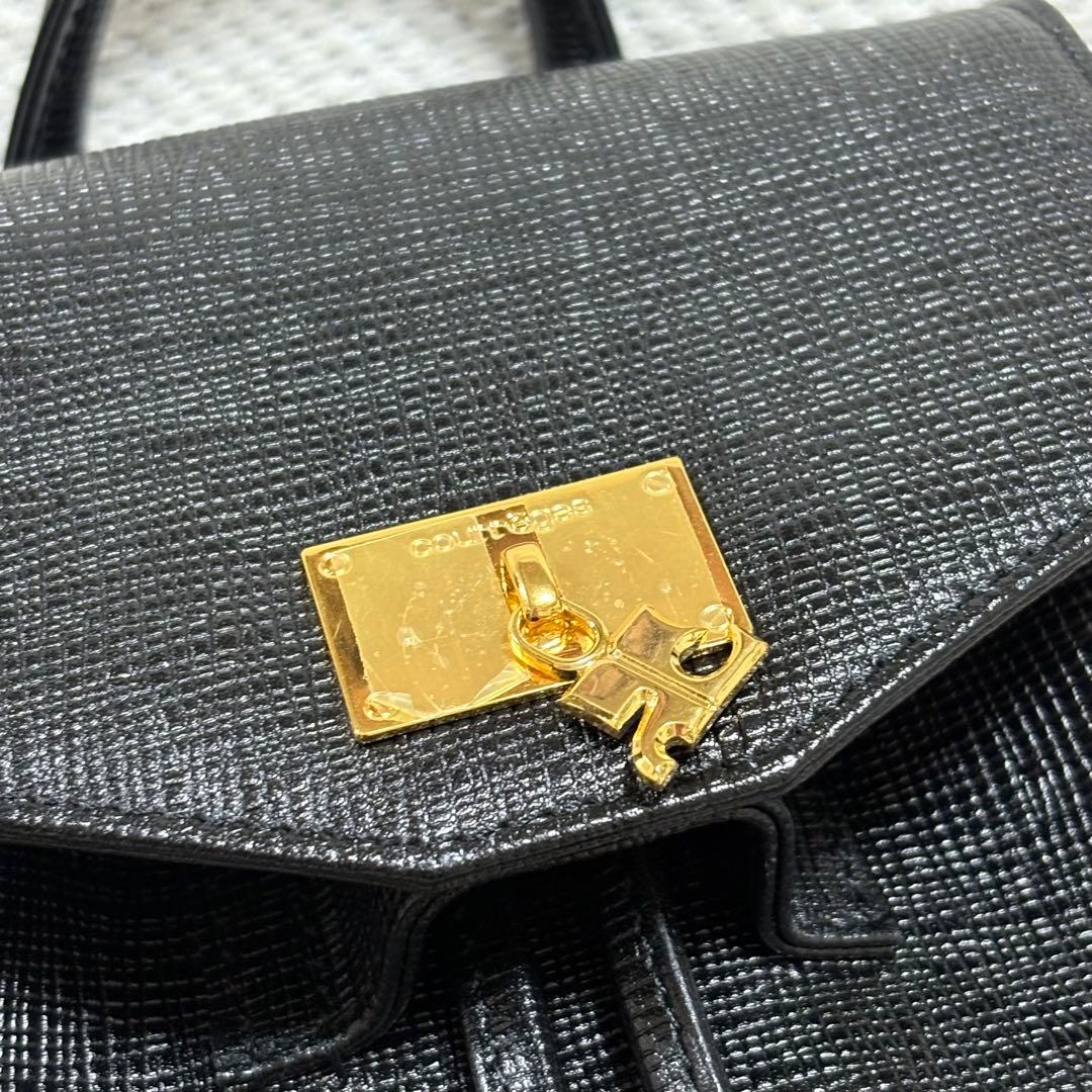 極美品 Courreges クレージュ 本革 レザー リュック ロゴチャーム