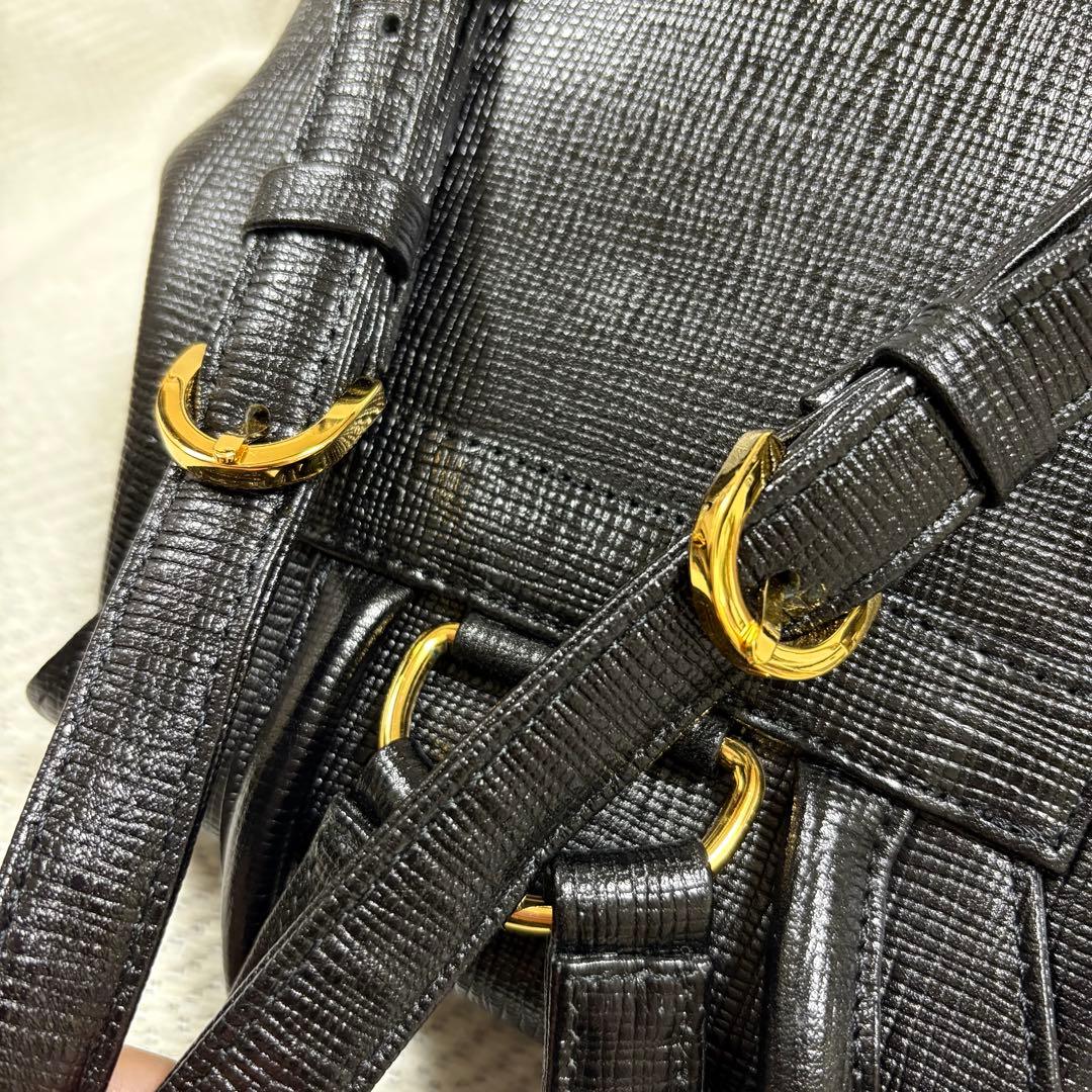 極美品 Courreges クレージュ 本革 レザー リュック ロゴチャーム