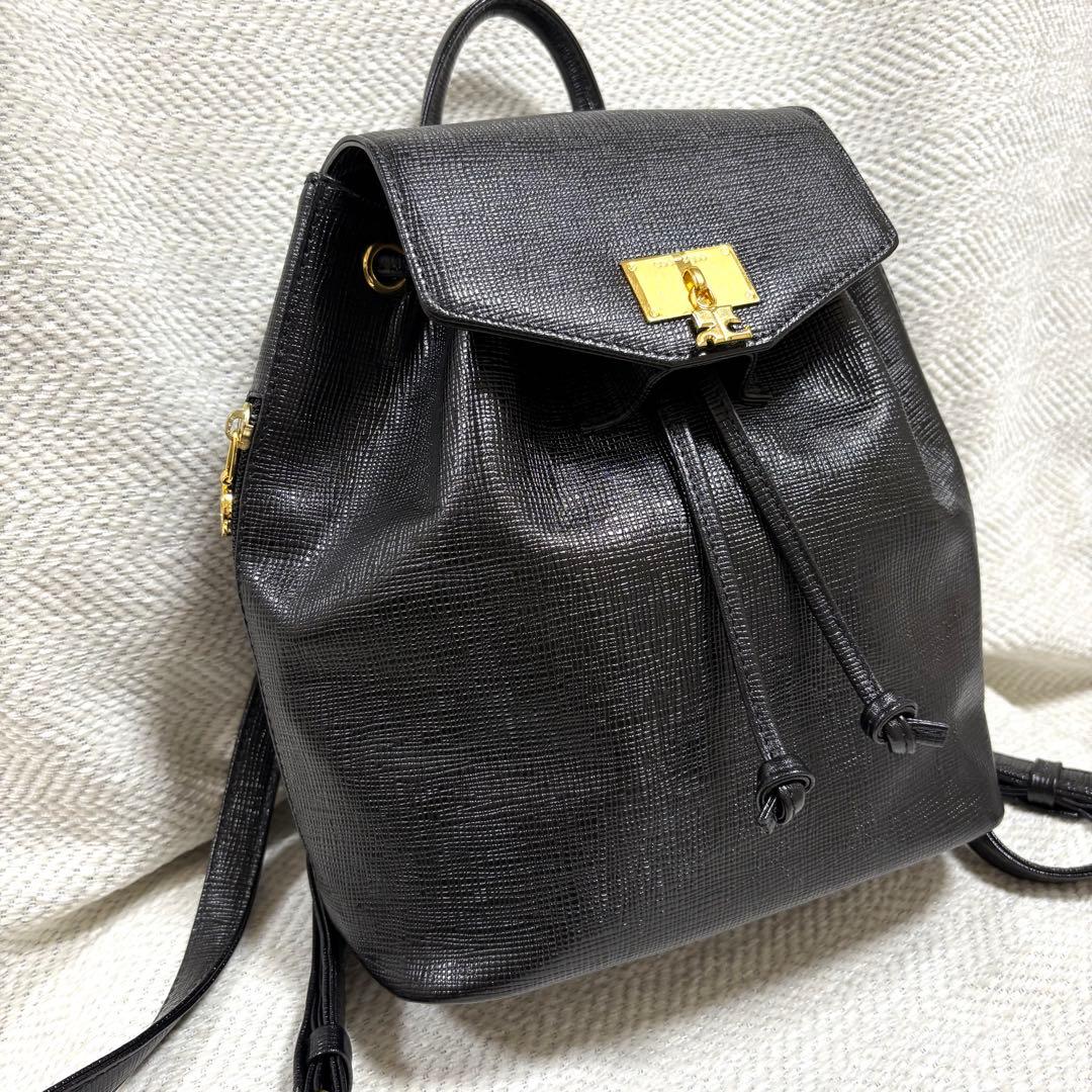 極美品 Courreges クレージュ 本革 レザー リュック ロゴチャーム