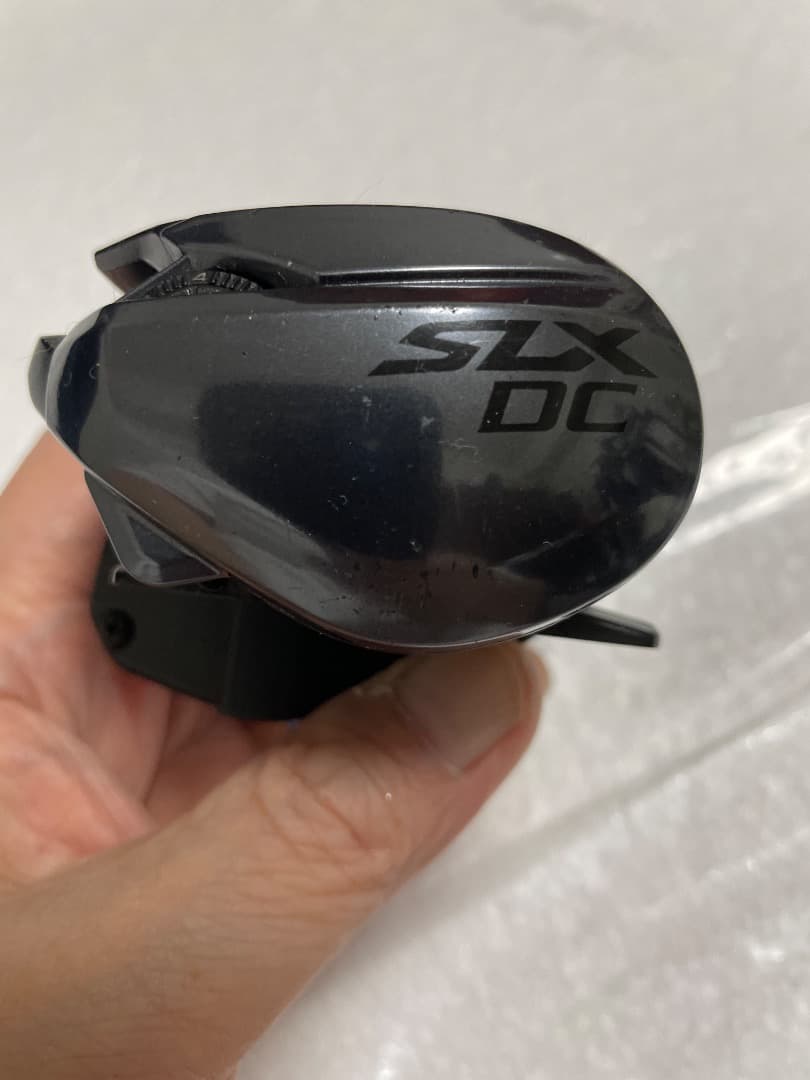 「純正を超える快感！フルベアリング仕様バサートハンドル付きの23 SLX DC」