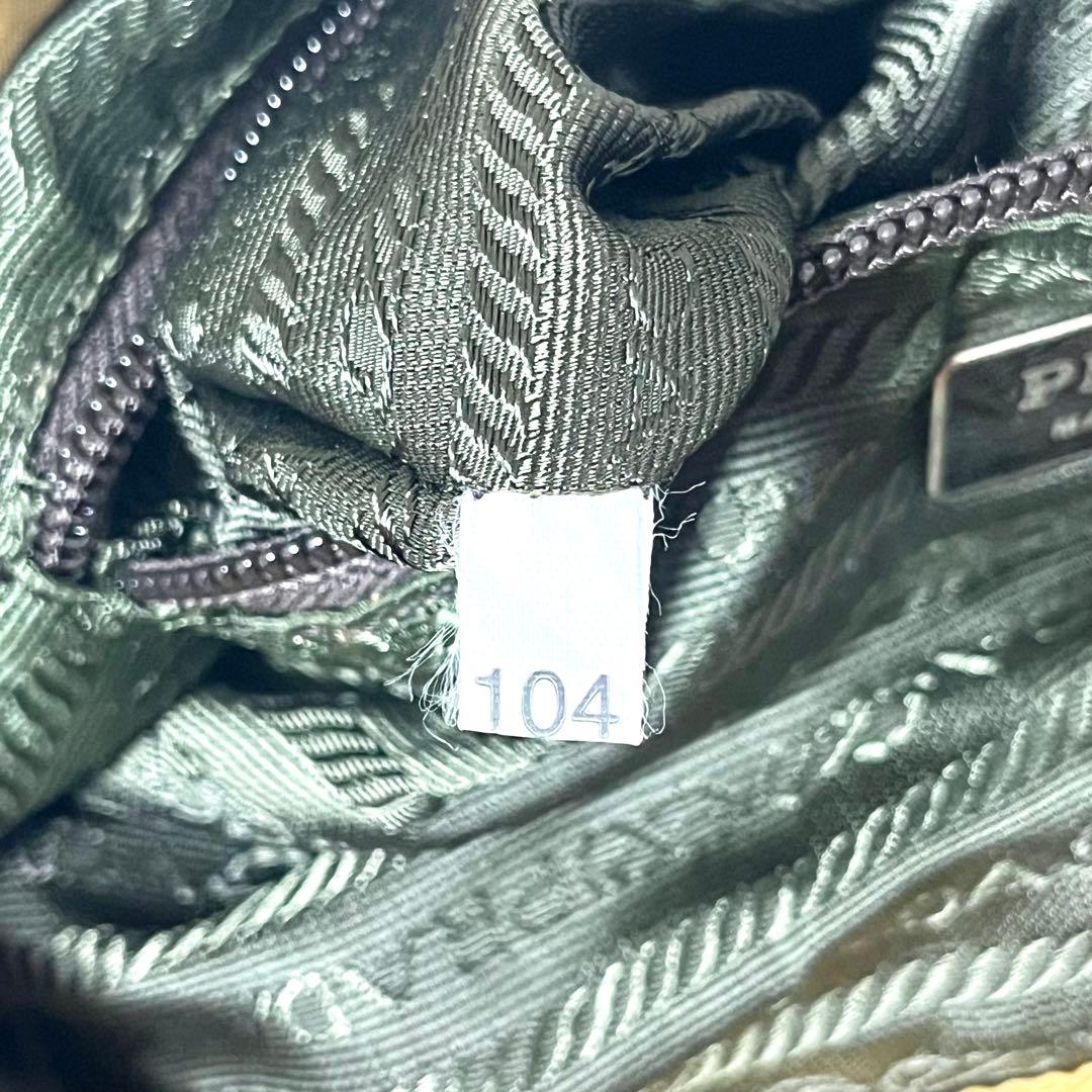 ✨入手困難✨希少カラー PRADA リュック 三角ロゴプレート ベージュ 巾着型