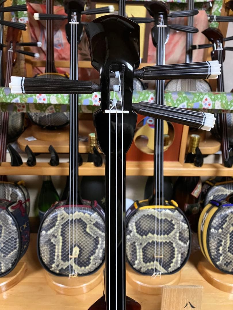 沖縄三線最高峰八重山黒木小ユナグシク本皮一枚張りスンチ塗り期間