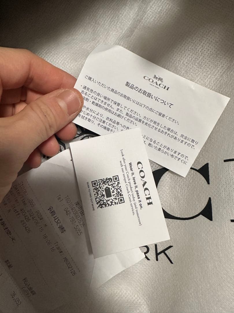 バッグ COACH PEBBLED LEATHER COURT BACKPACK