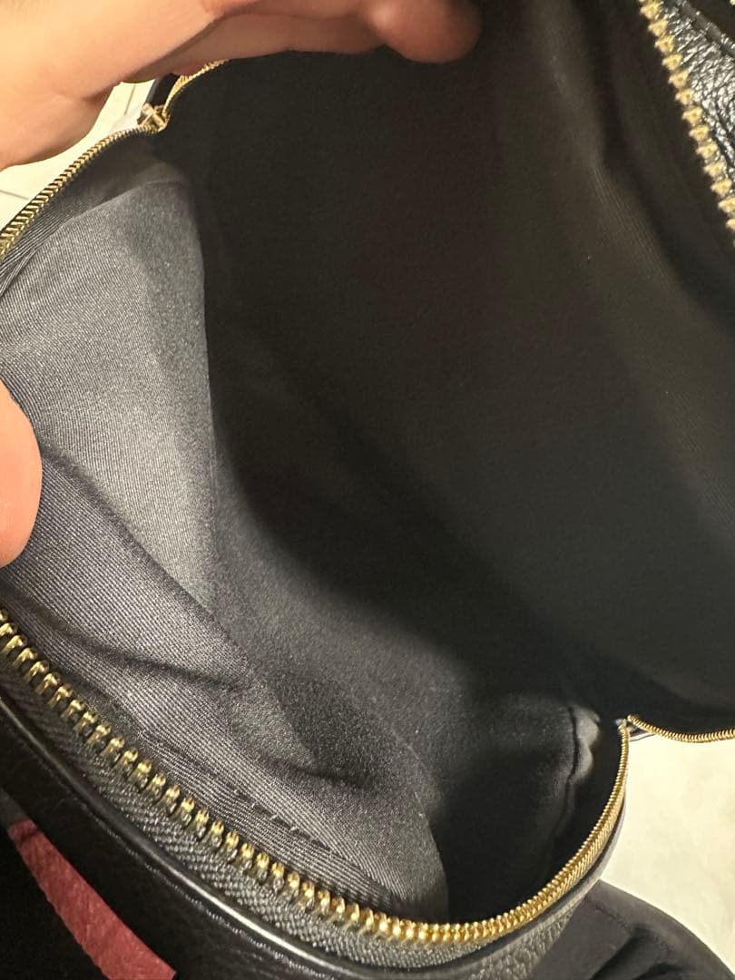 バッグ COACH PEBBLED LEATHER COURT BACKPACK